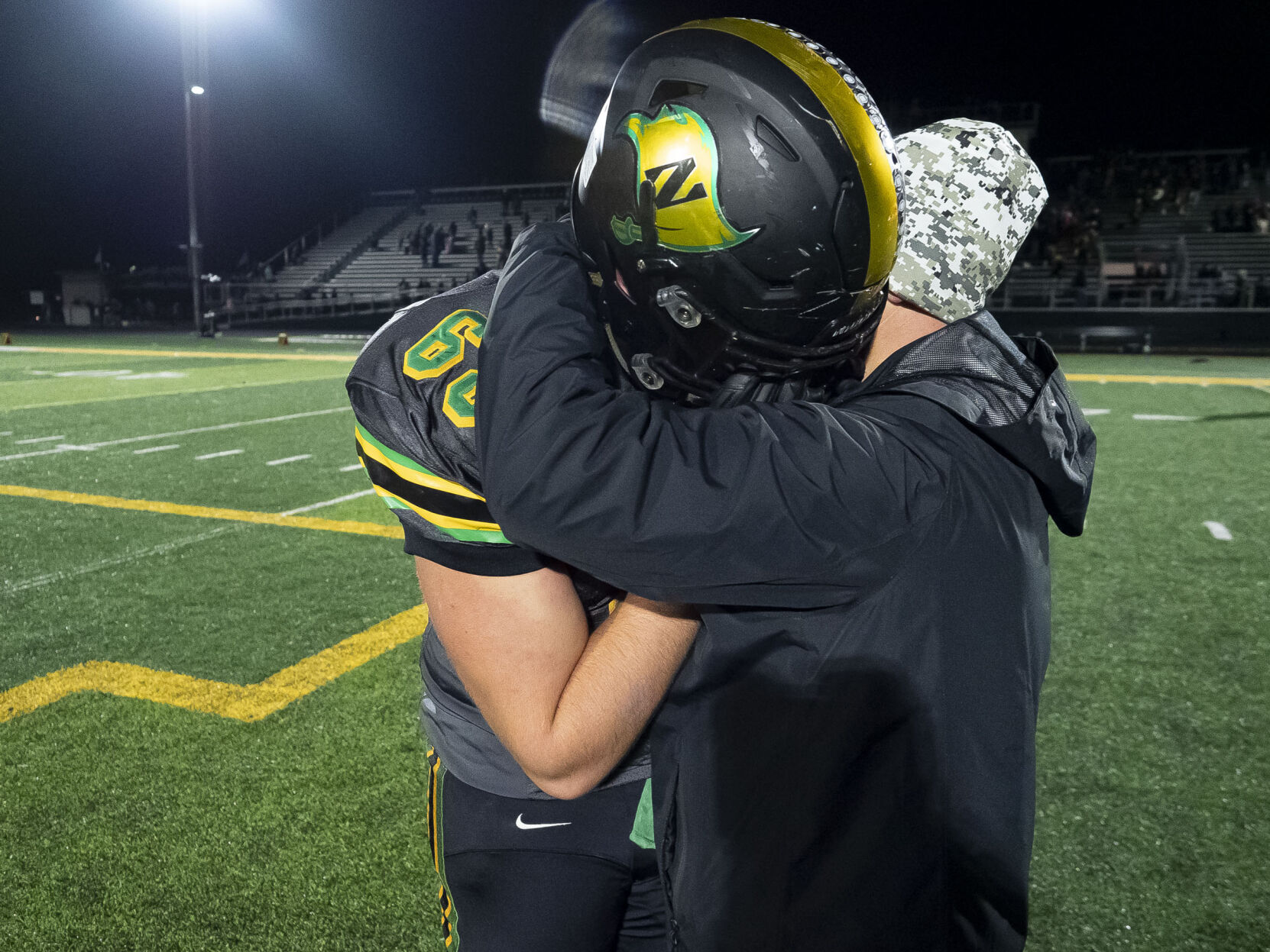 Evan Dustin Kaehr hug after Mississinewa